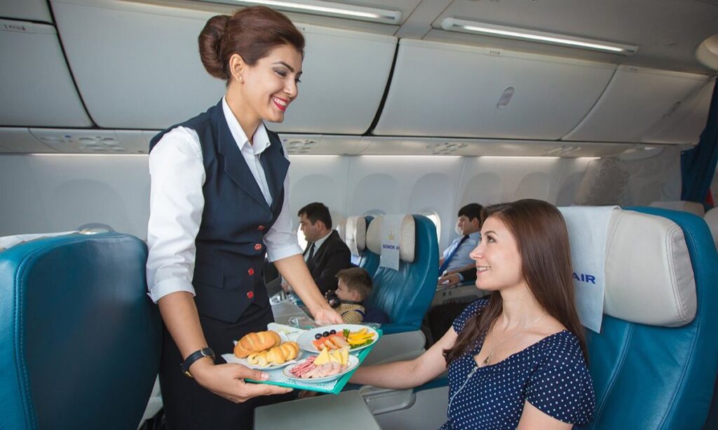 Why do flight attendants sit on their hands during takeoff and landing? 2 Where air hostess learn this etiquette